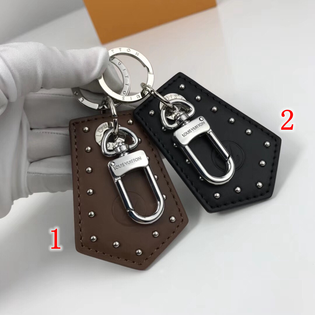 LEGACY ENCHAPE BAG CHARM AND KEY HOLDER M62800