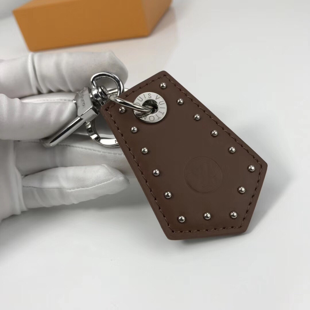 LEGACY ENCHAPE BAG CHARM AND KEY HOLDER M62800