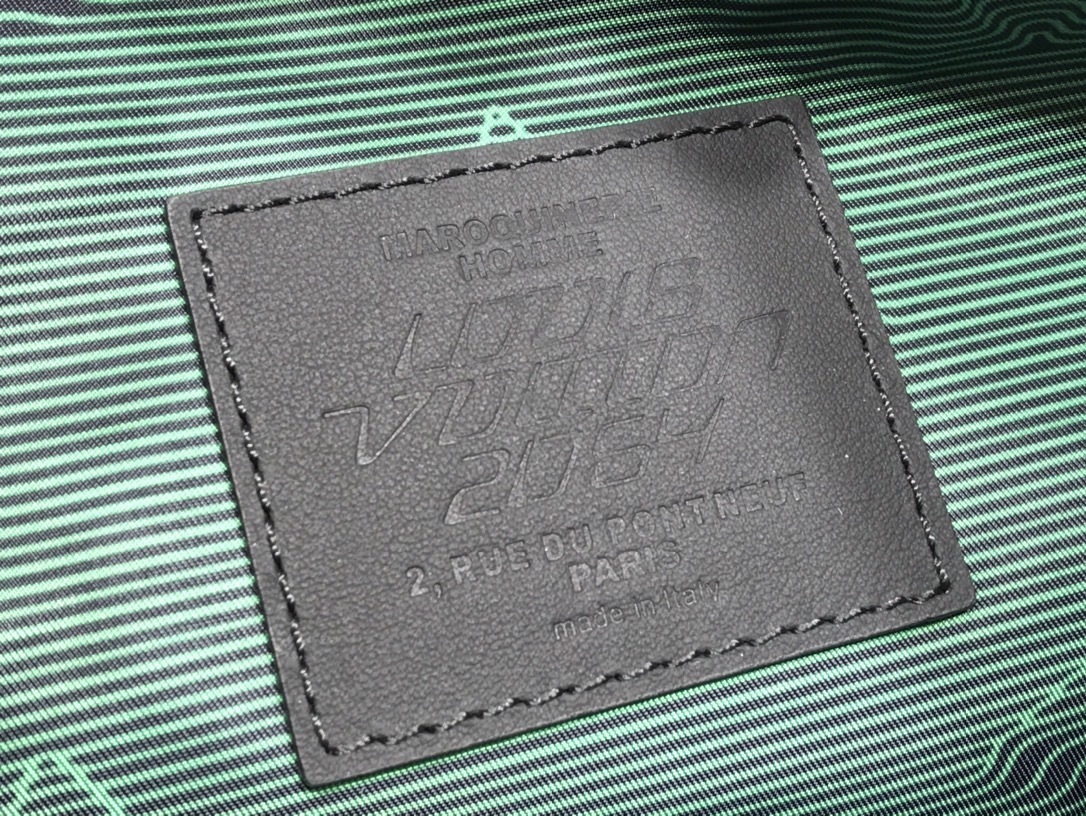 LV 2054 REVERSIBLE KEEPALL BANDOULIERE 50 M45602