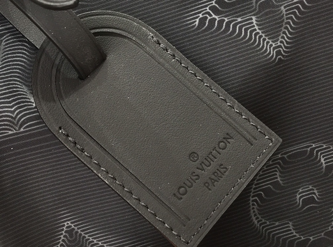 LV 2054 REVERSIBLE KEEPALL BANDOULIERE 50 M45602