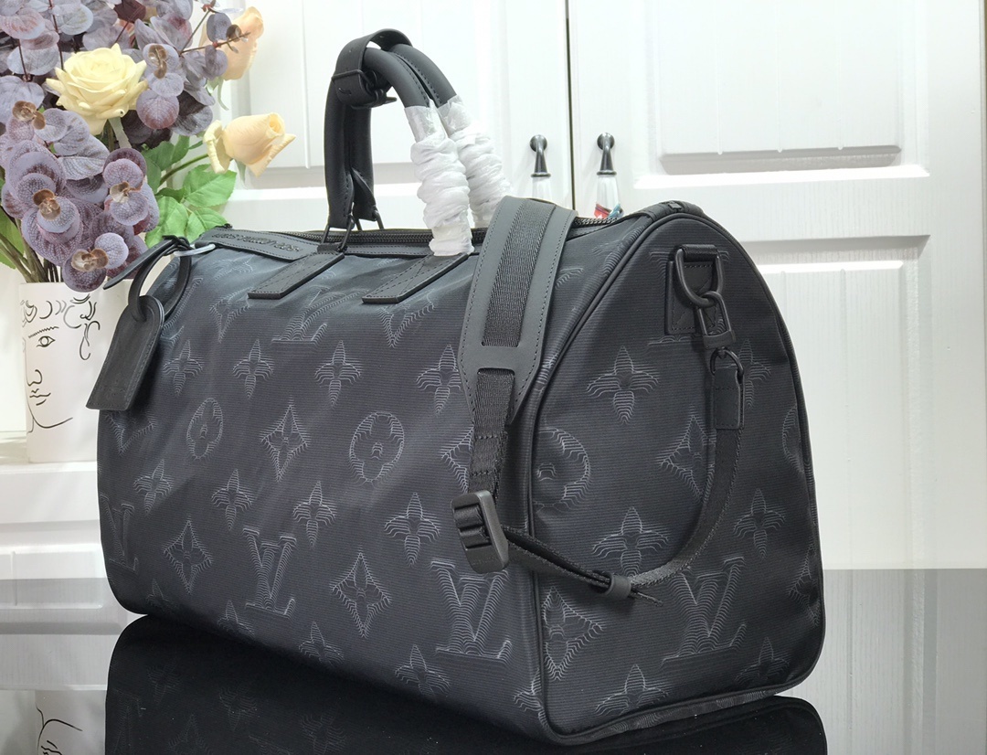 LV 2054 REVERSIBLE KEEPALL BANDOULIERE 50 M45602