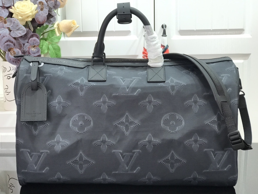 LV 2054 REVERSIBLE KEEPALL BANDOULIERE 50 M45602