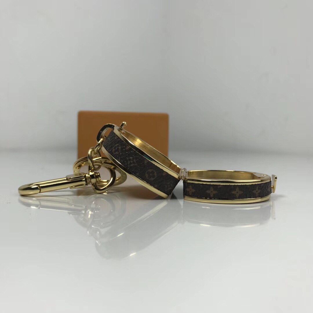 LV BOITE CHAPEAU BAG CHARM AND KEY HOLDER M63089 