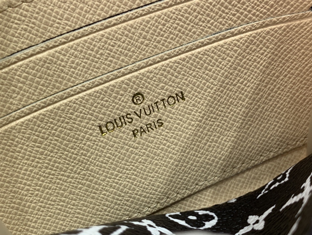 LV CRAFTY ZIPPY COIN PURSE M69496