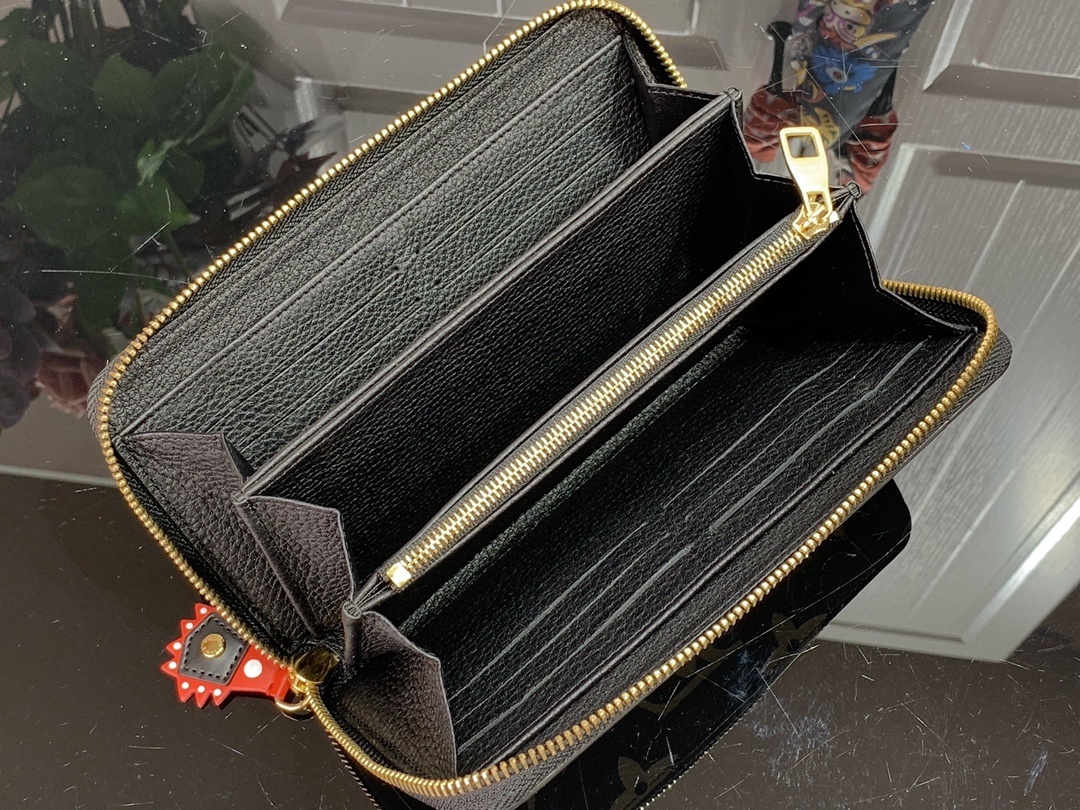LV CRAFTY ZIPPY wallet M69698