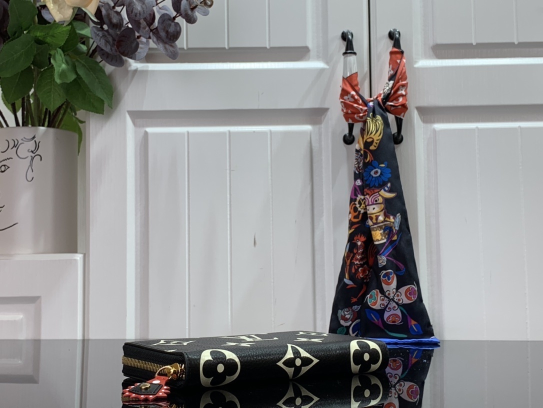 LV CRAFTY ZIPPY wallet M69698