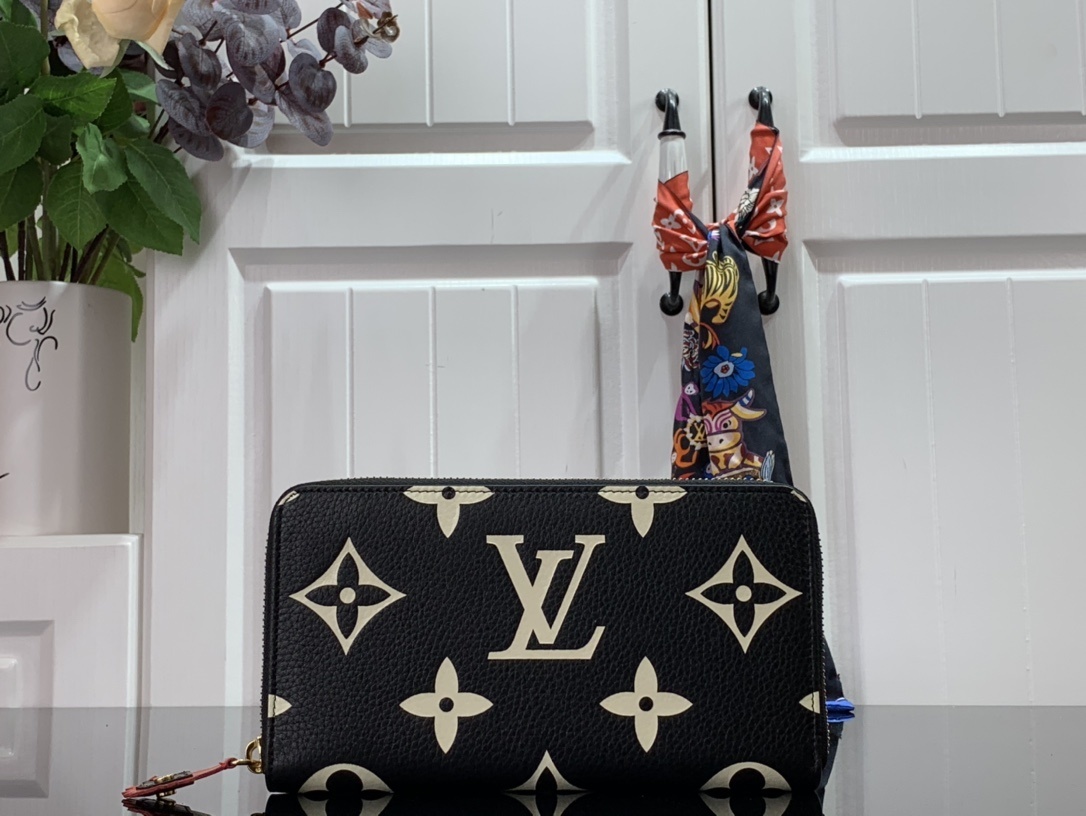 LV CRAFTY ZIPPY wallet M69698