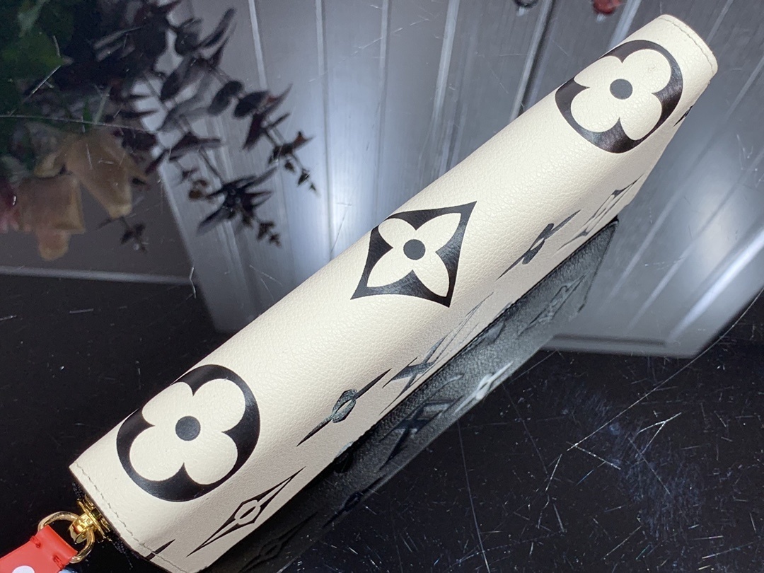 LV CRAFTY ZIPPY wallet M69698