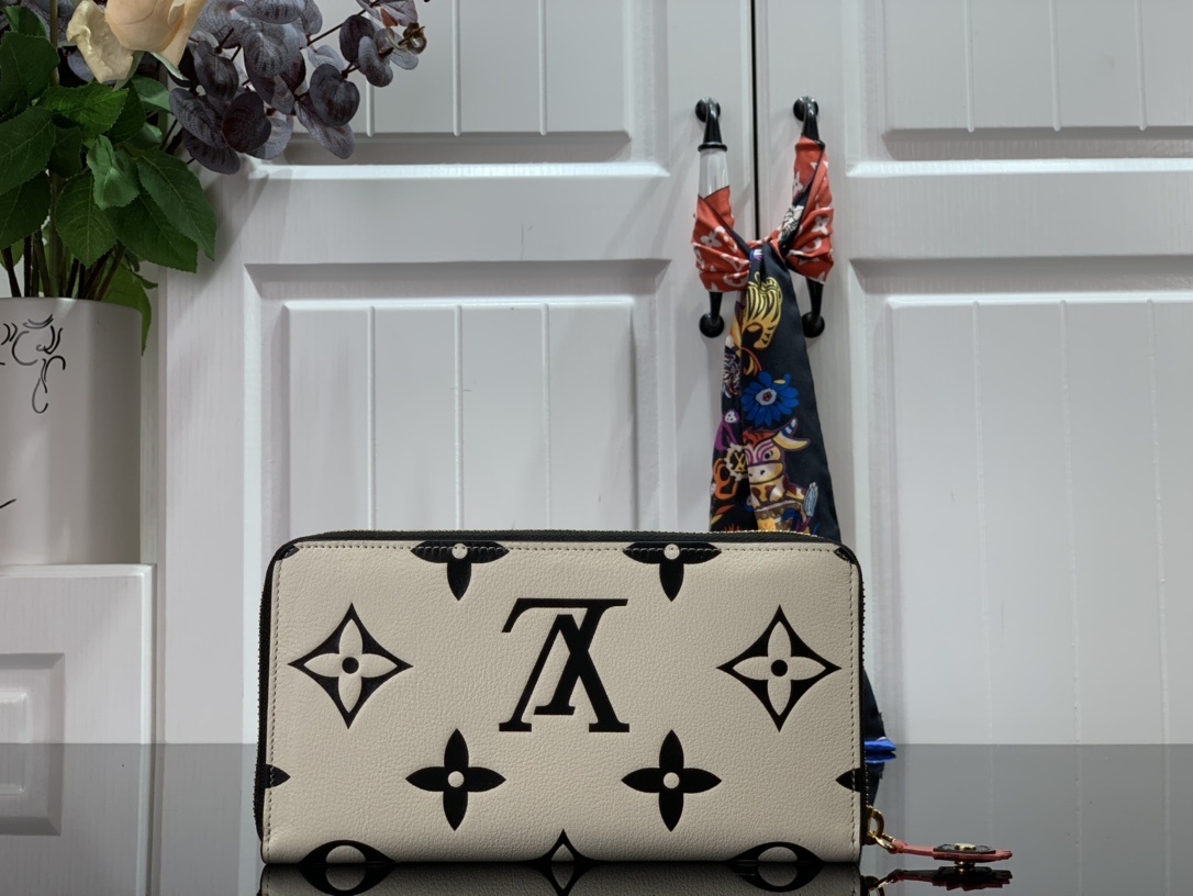 LV CRAFTY ZIPPY wallet M69698