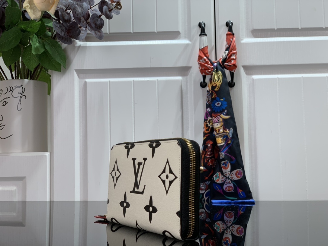 LV CRAFTY ZIPPY wallet M69698