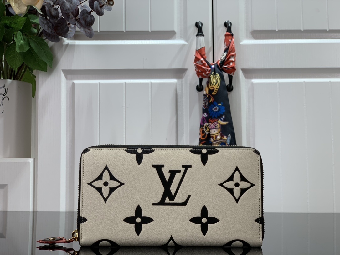 LV CRAFTY ZIPPY wallet M69698
