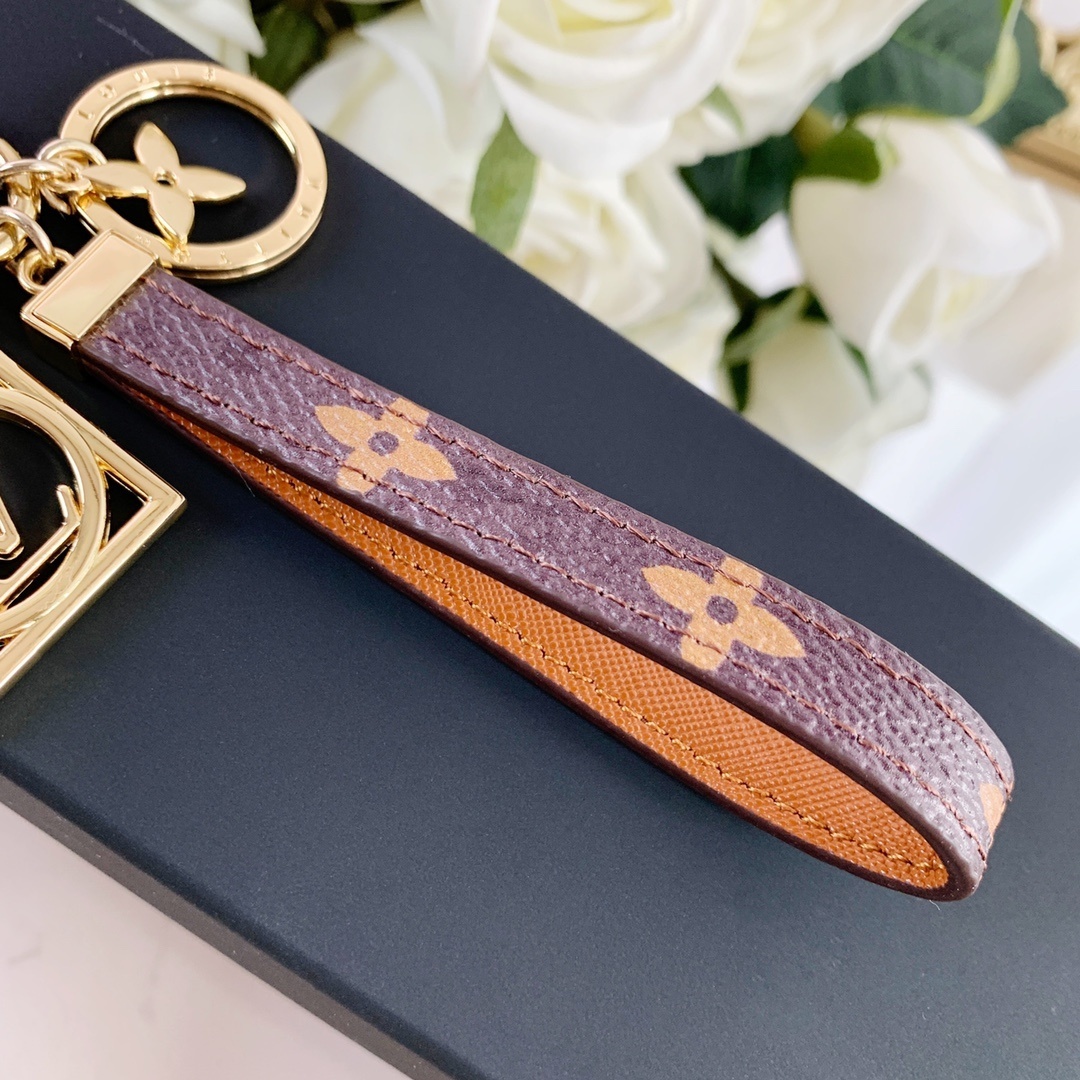 LV DAUPHINE BAG CHARM AND KEYI HOLDER M69564