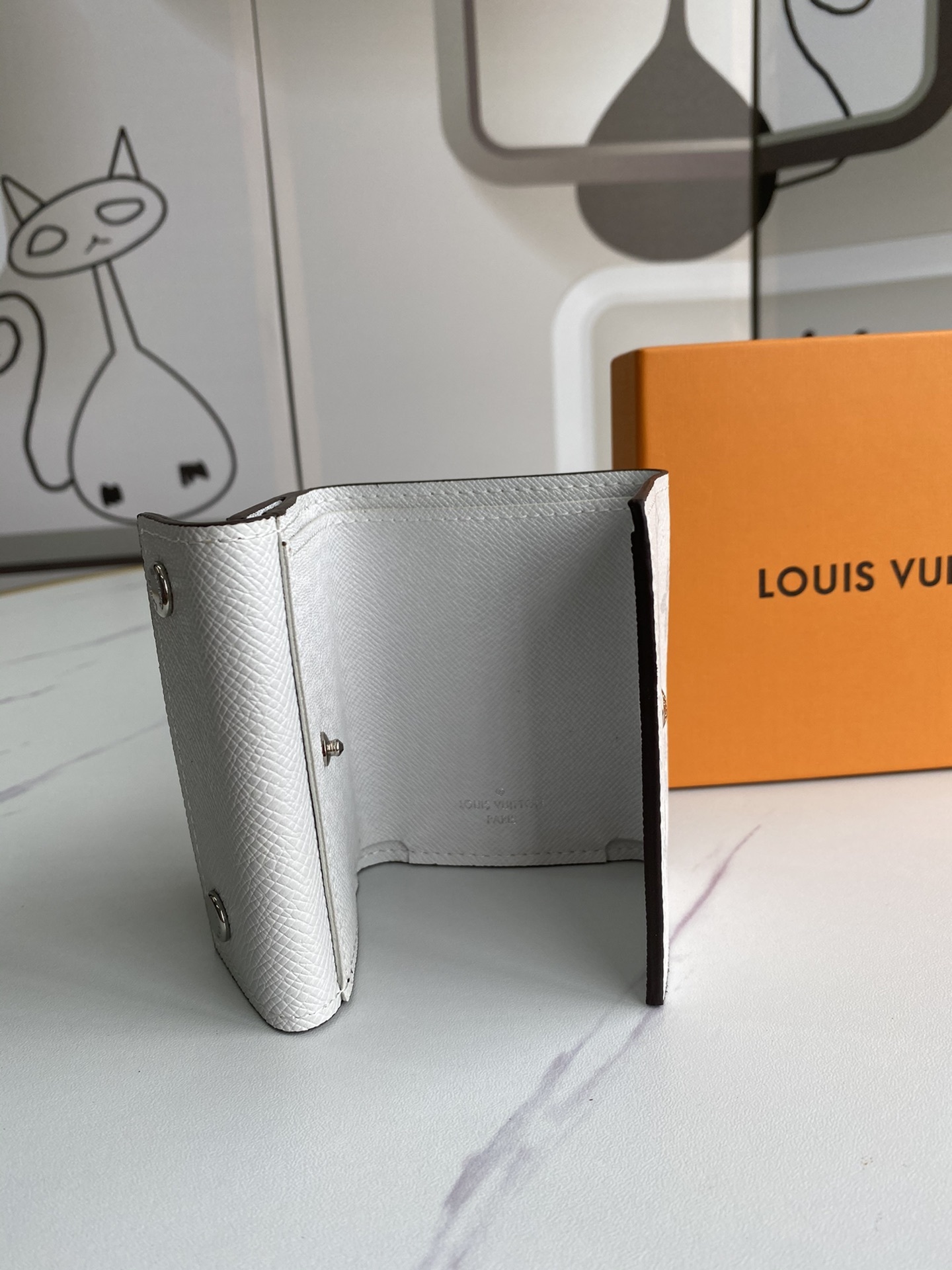 LV DISCOVERY COMPACT wallet M67630 