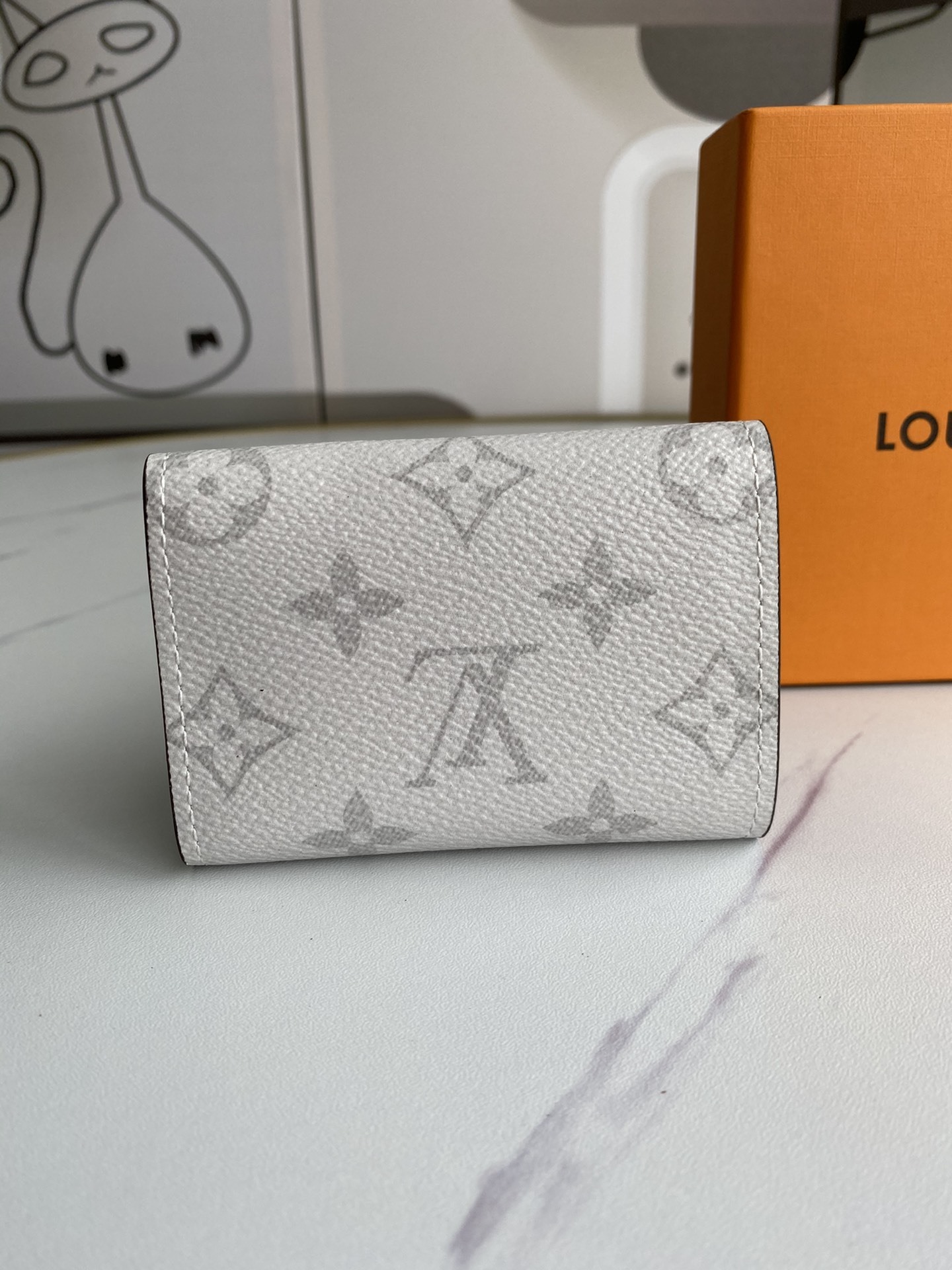LV DISCOVERY COMPACT wallet M67630 