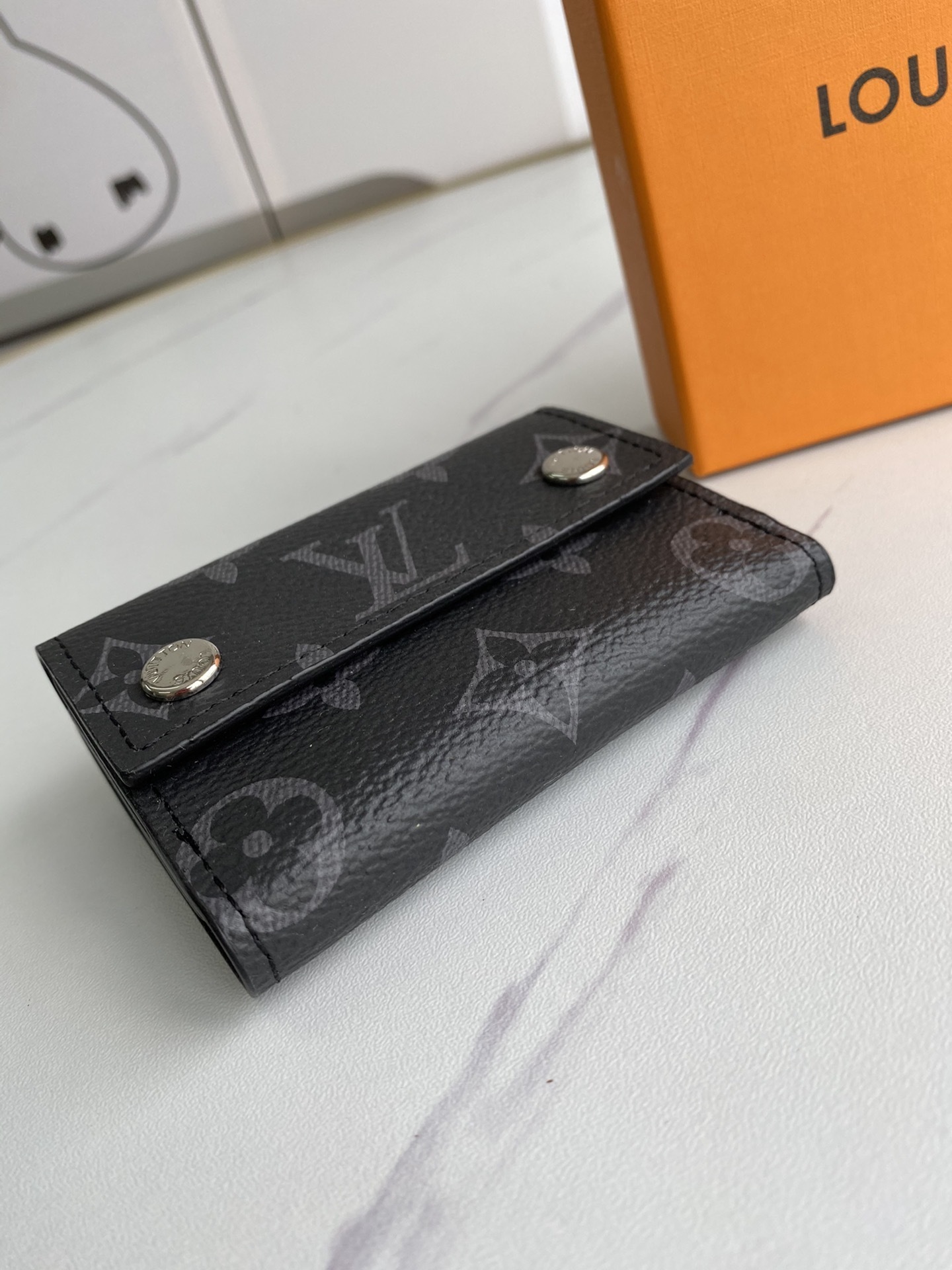 LV DISCOVERY COMPACT wallet M67630 