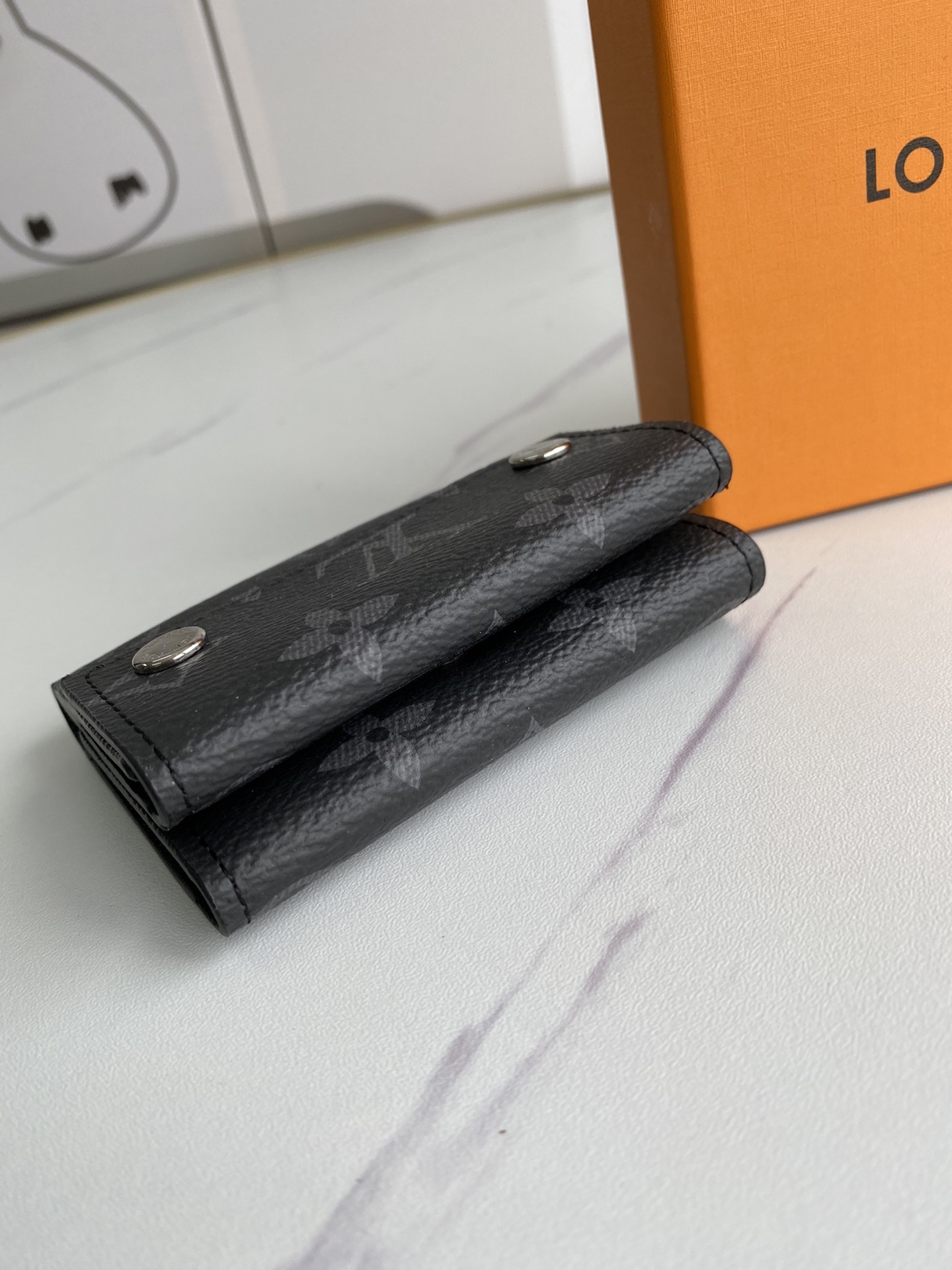 LV DISCOVERY COMPACT wallet M67630 