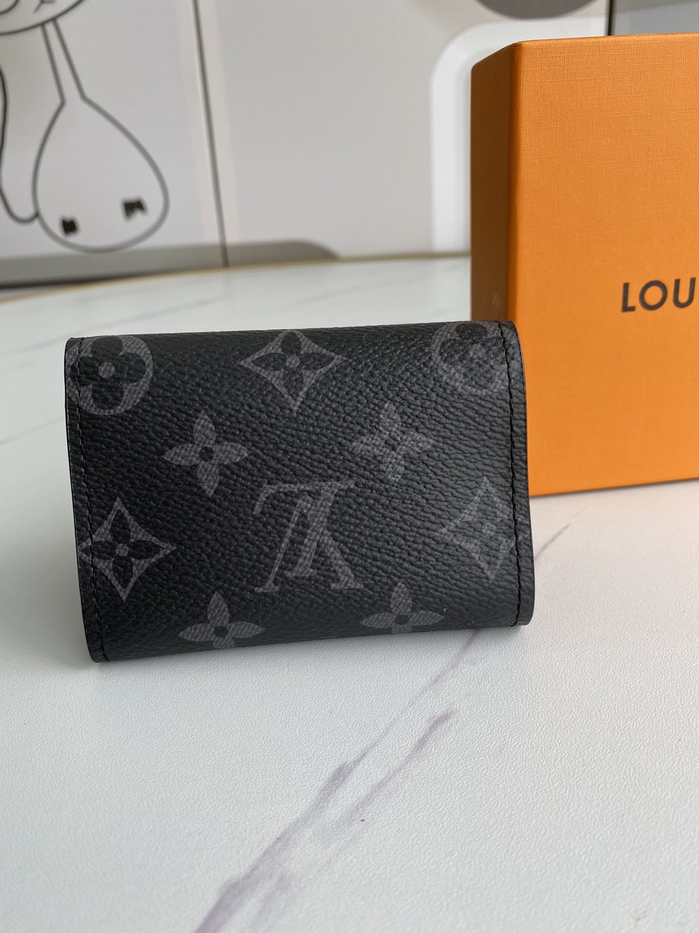 LV DISCOVERY COMPACT wallet M67630 