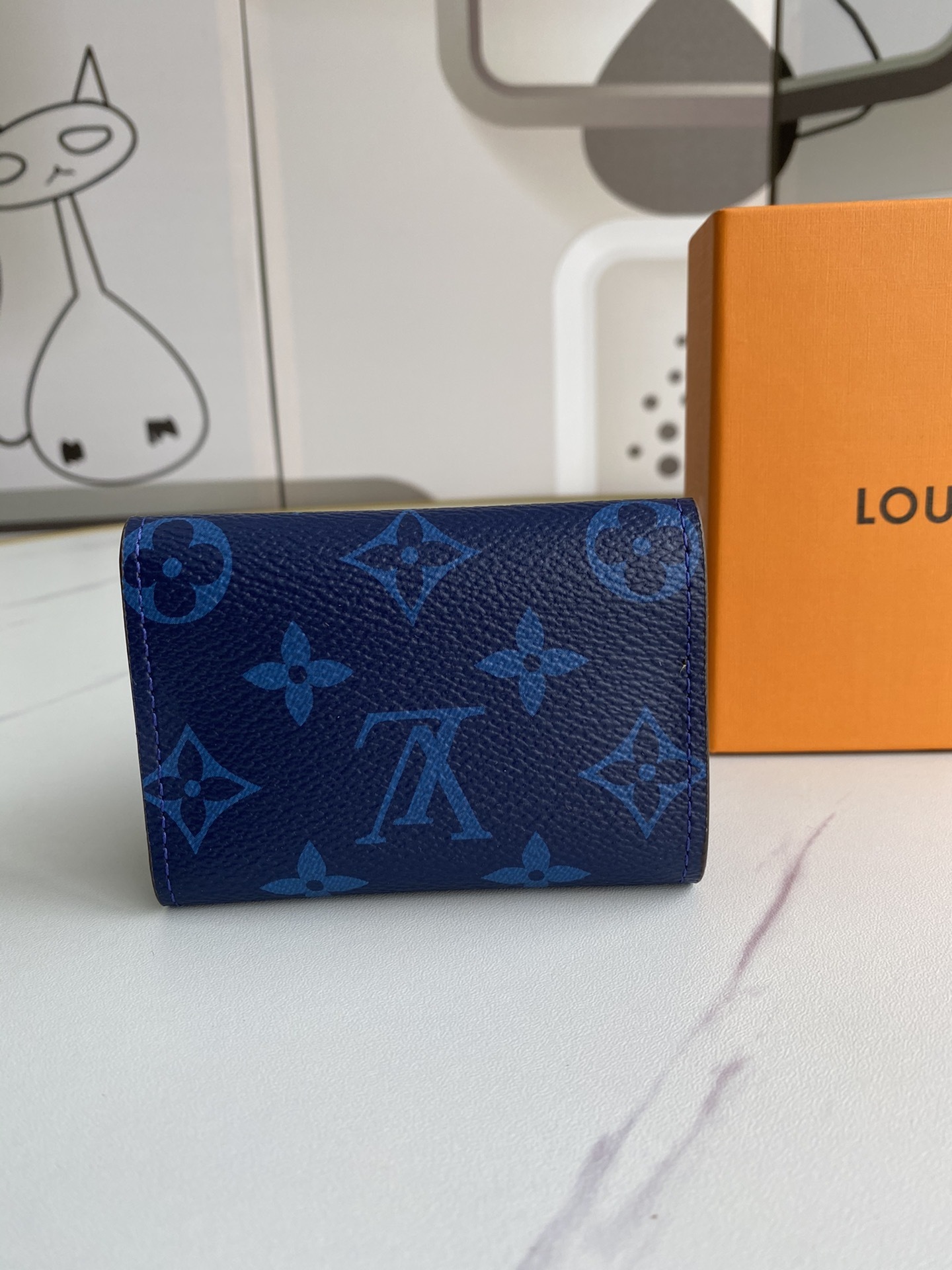 LV DISCOVERY COMPACT wallet M67630