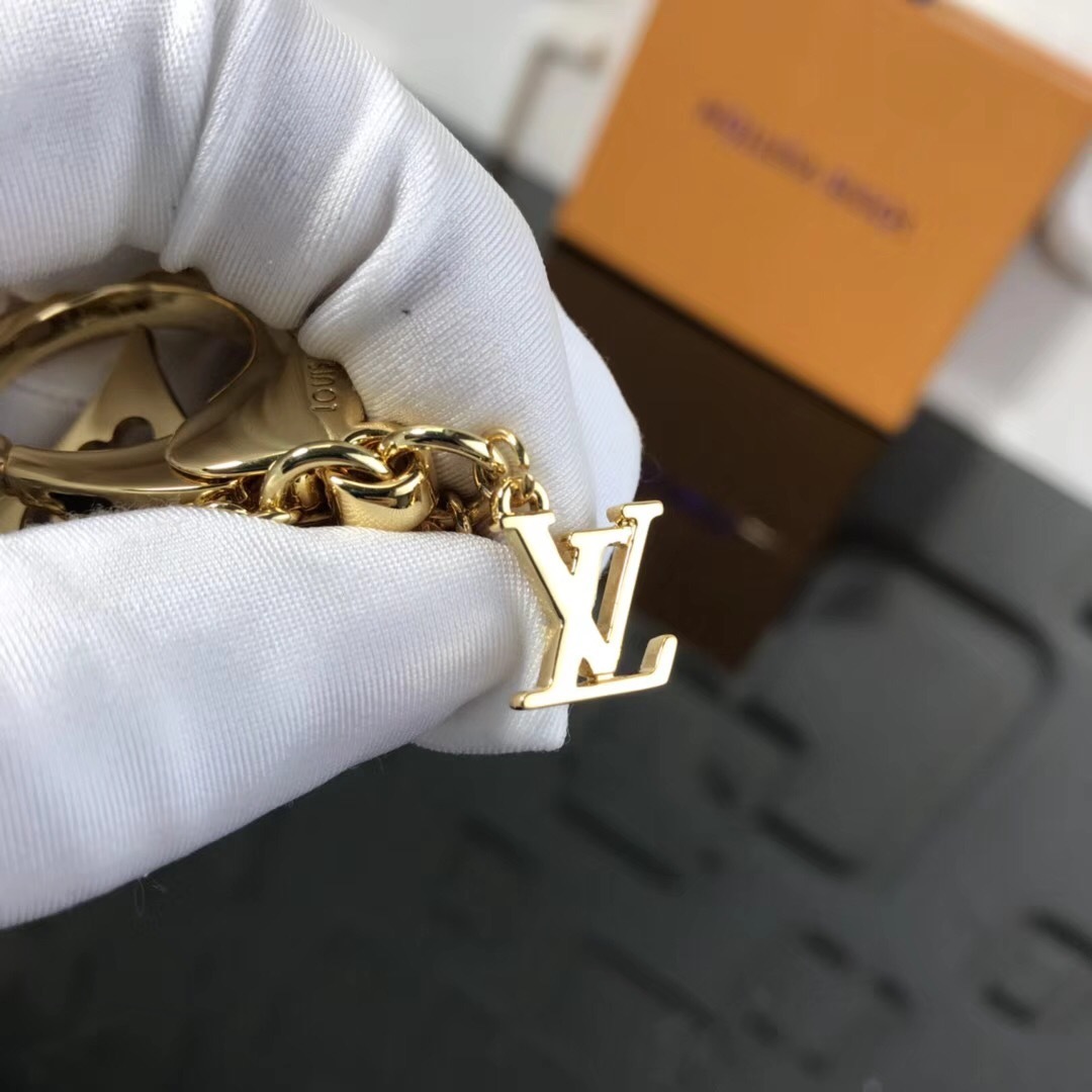 LV FETISH FLOWER BAG CHARM AND KEY HOLDER M65333