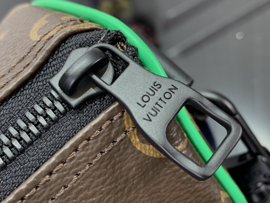 LV KEEPALL BANDOULIERE 25 M46249