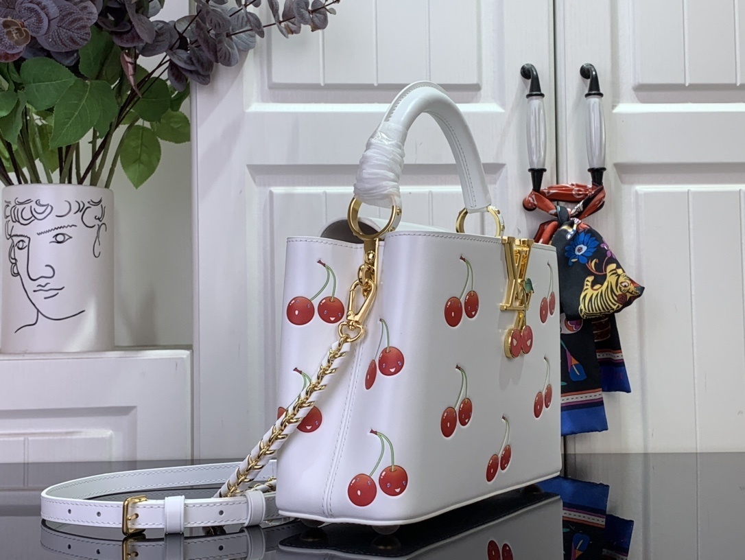 LV LV x TM CAPUCINES m13251