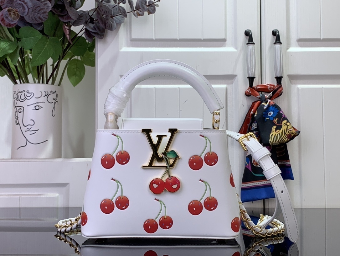 LV LV x TM CAPUCINES m13251