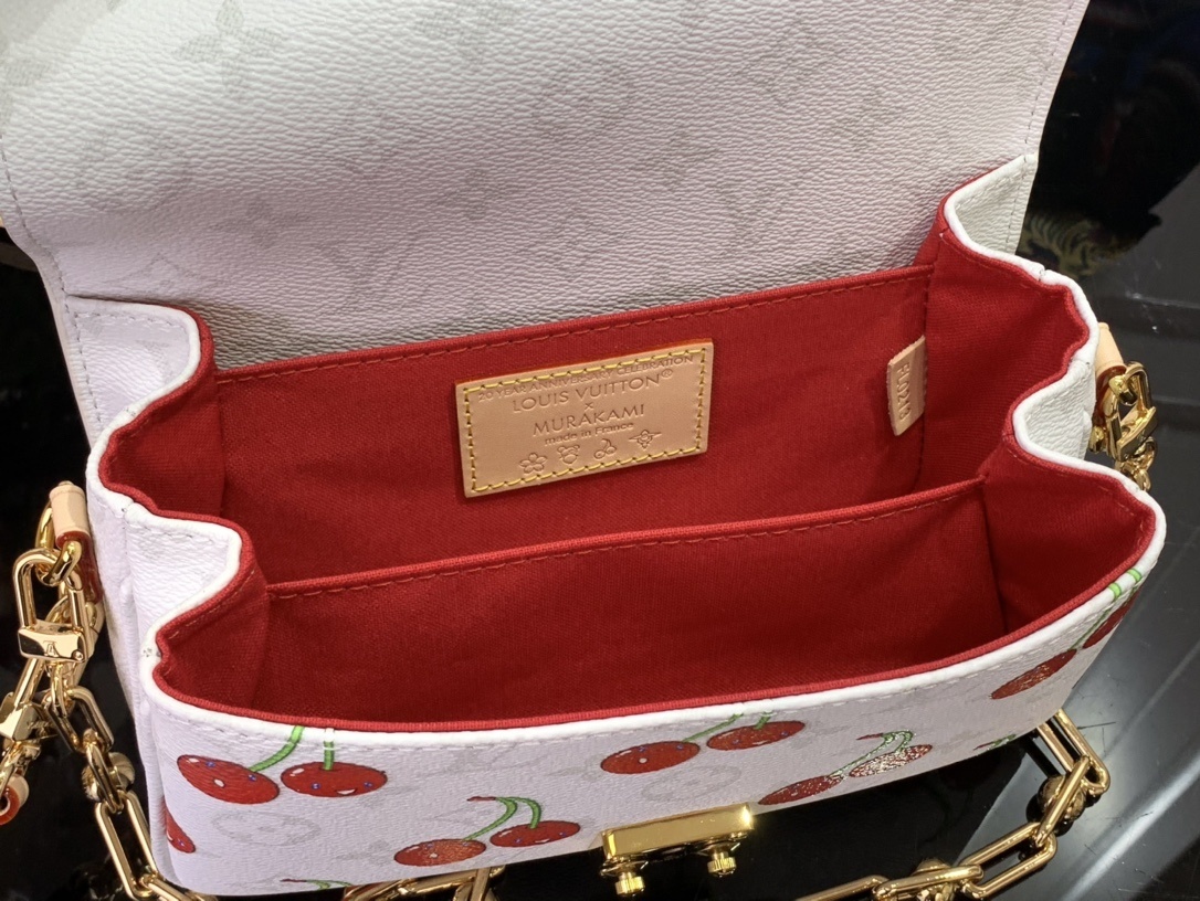 LV LV x TM POCHETTE M??TIS EAST WEST M14231