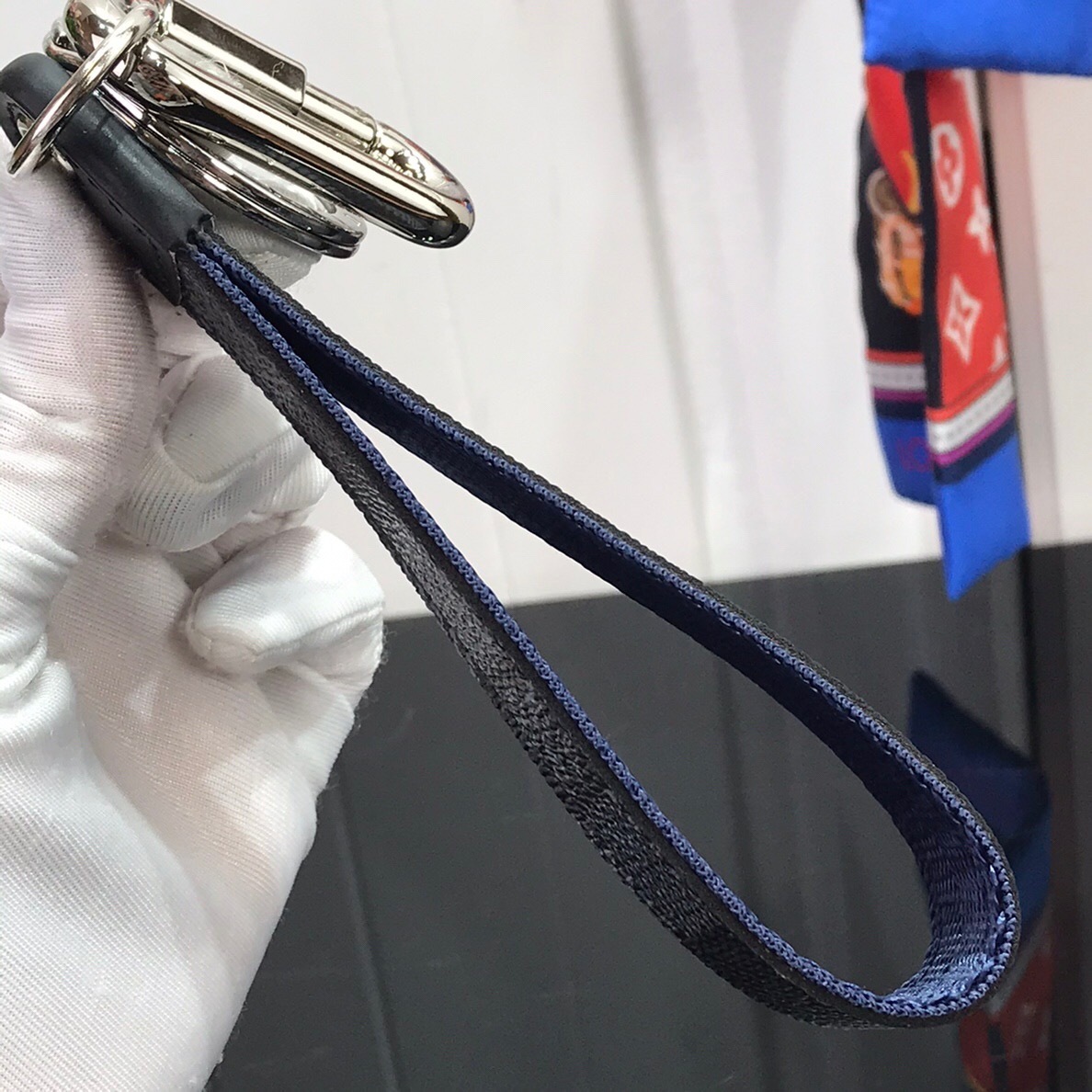 LV MATCHPOINT DRAGONNE KEY HOLDER M68279