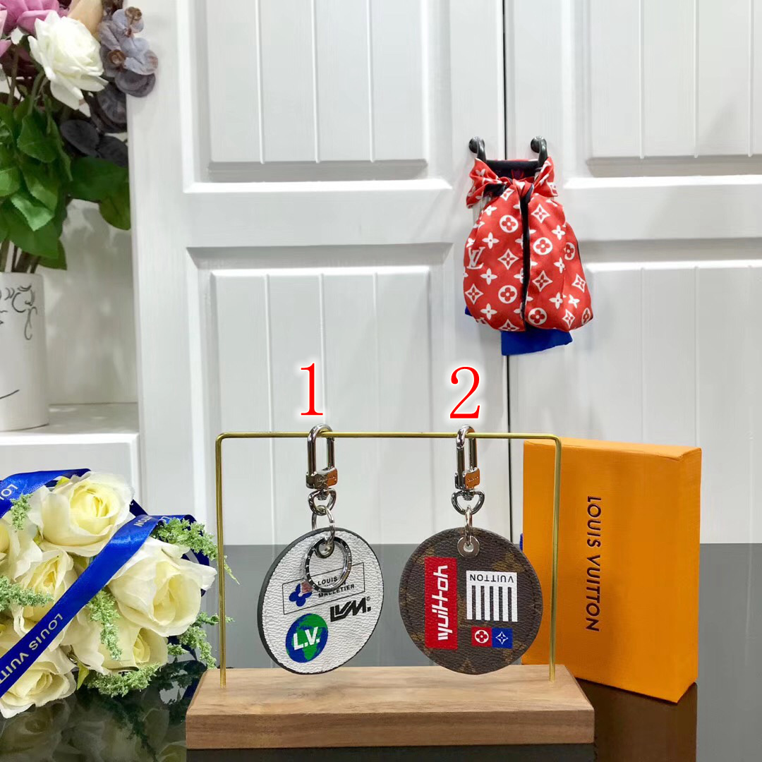 LV MONOGRAM LOGOS ILLUSTRE BAG CHARM AND KEY HOLDER M68300