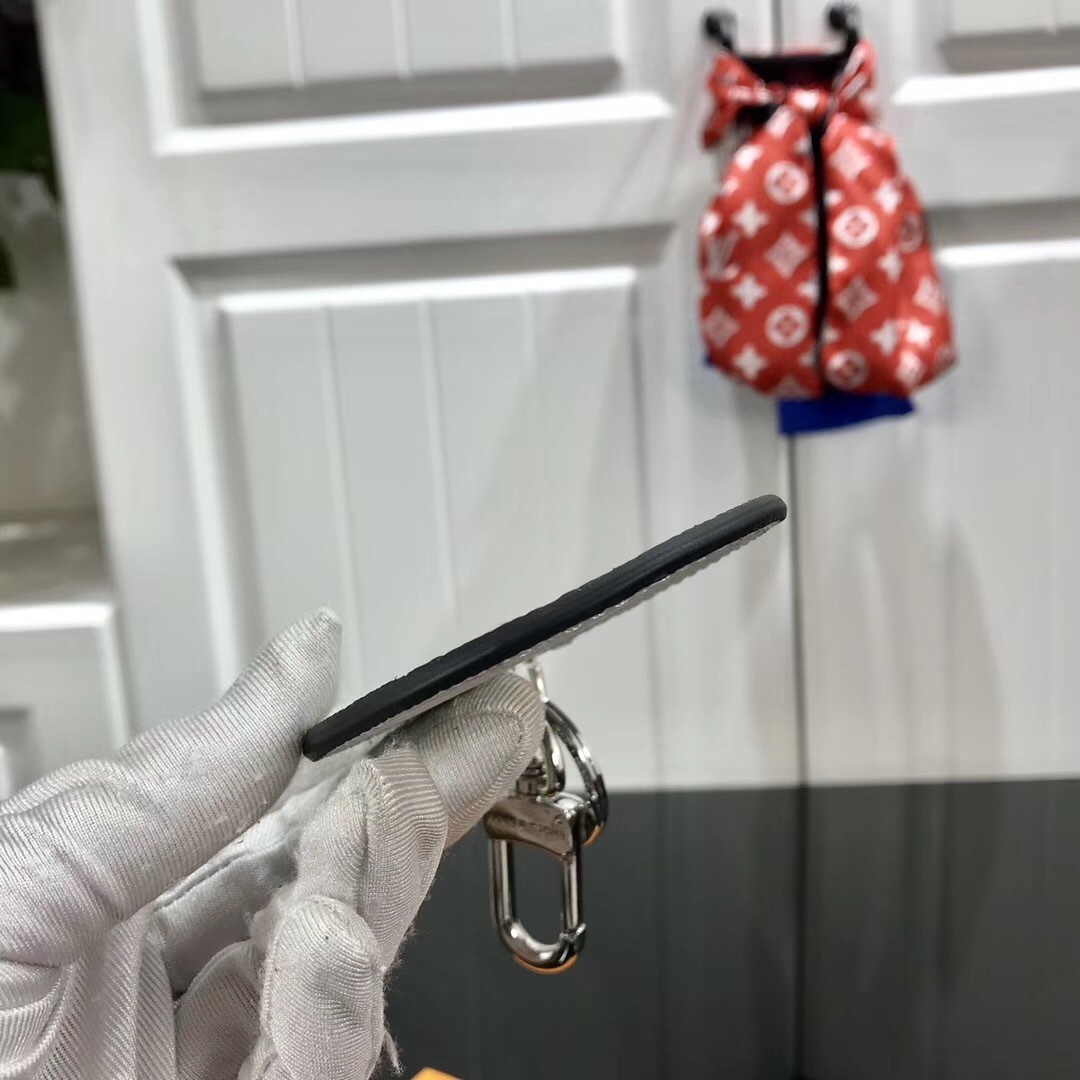 LV MONOGRAM LOGOS ILLUSTRE BAG CHARM AND KEY HOLDER M68300