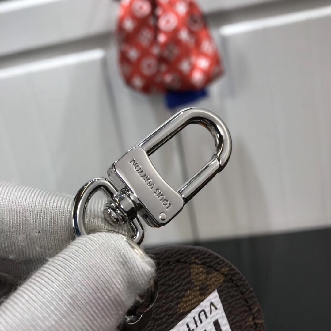 LV MONOGRAM LOGOS ILLUSTRE BAG CHARM AND KEY HOLDER M68300