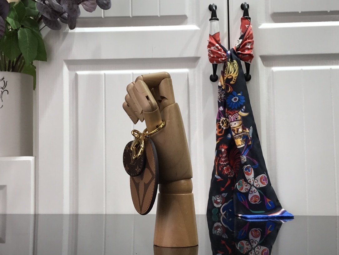 LV MONOGRAM REVERSE KEY HOLDER AND BAG CHARM M69317