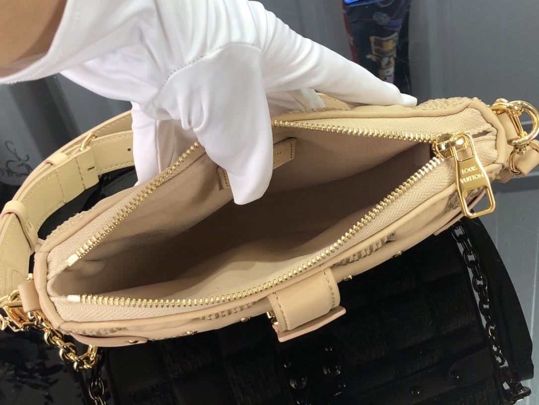 LV POCHETTE TROCA M59046