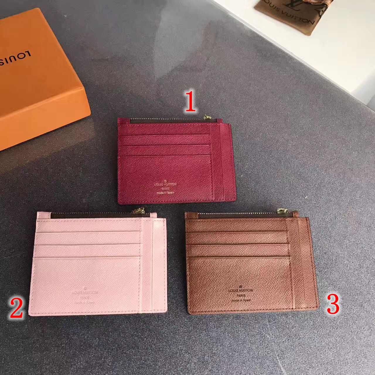 LV PORTE-CARTE ZIPPE M66531