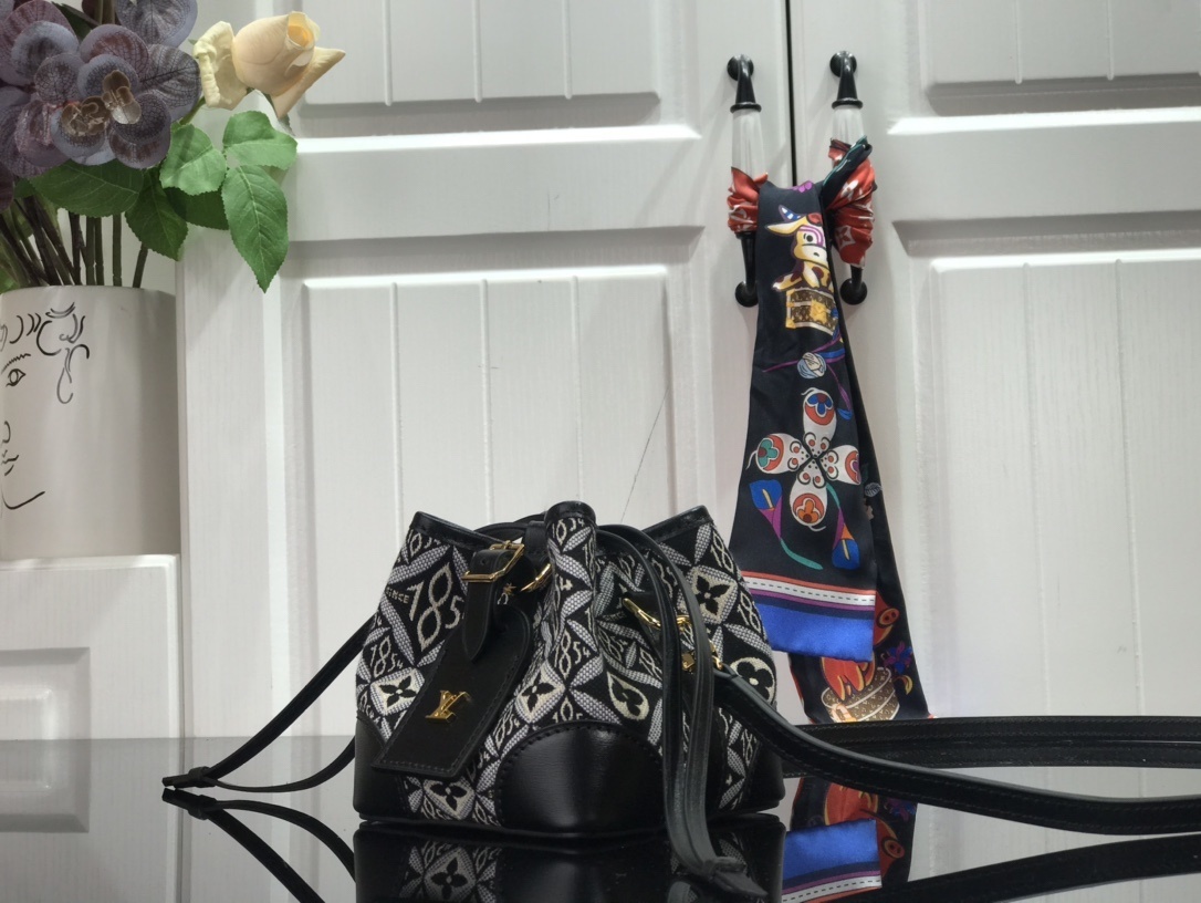 LV SINCE 1854 NOE PURSE M69973 