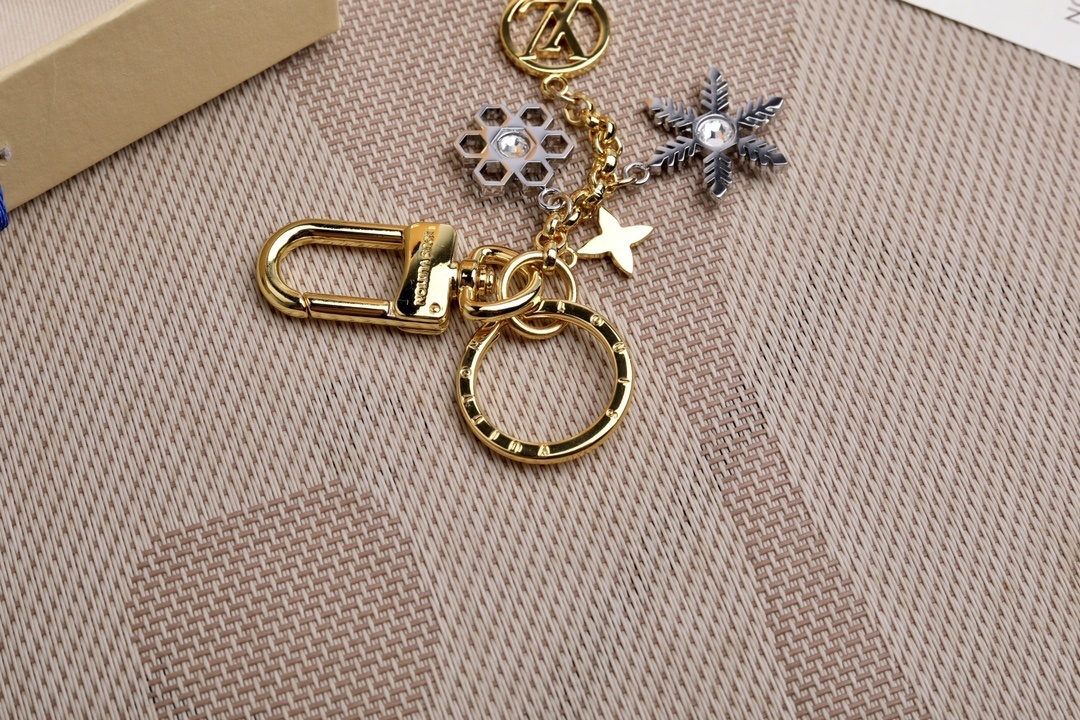 LV SNOWFLAKES BAG CHARM AND KEY HOLDER M80240