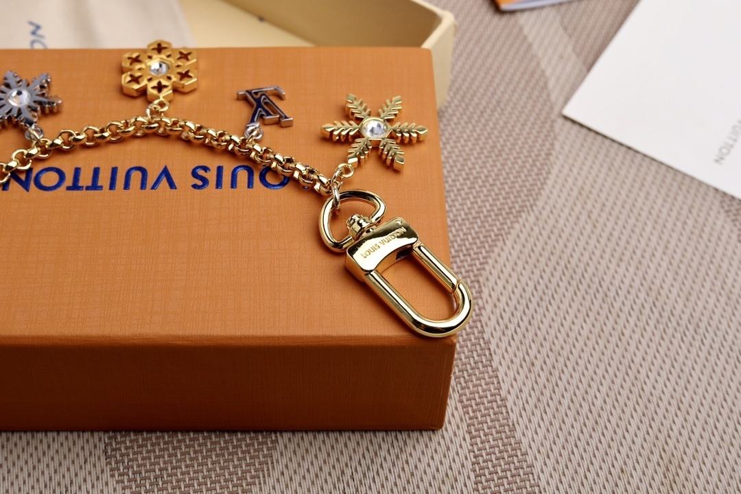 LV SNOWFLAKES CHAIN BAG CHARM M80245 