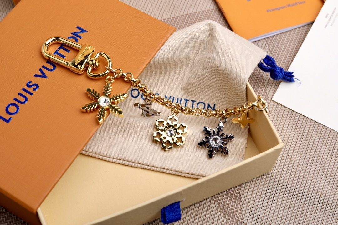 LV SNOWFLAKES CHAIN BAG CHARM M80245