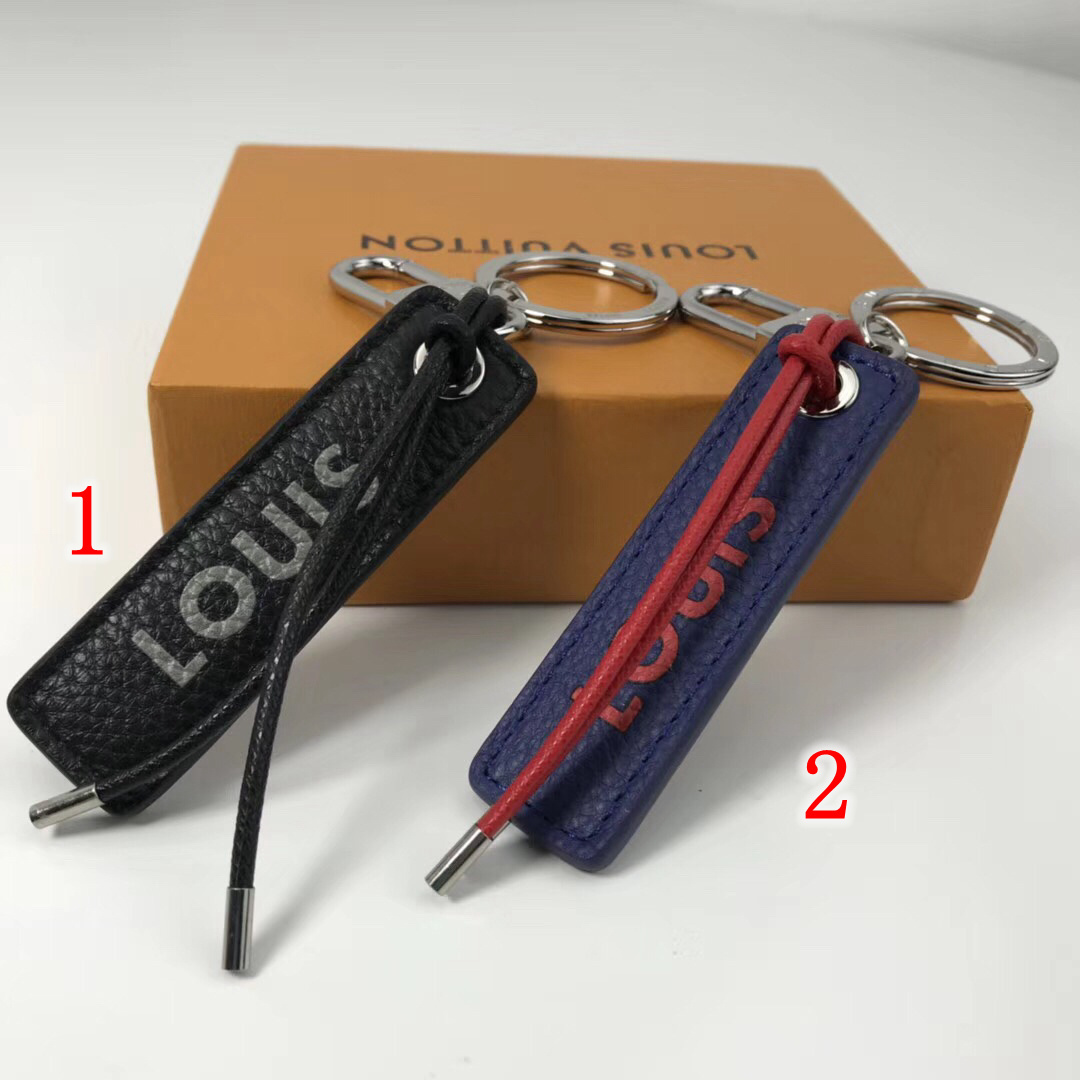 LV TAB LOUIS VUITTON BAG CHARM AND KEY HOLDER M64173