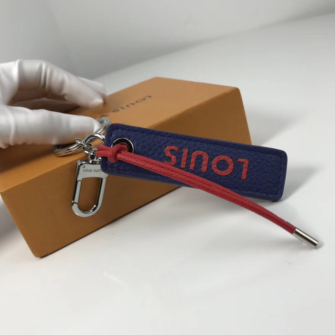 LV TAB LOUIS VUITTON BAG CHARM AND KEY HOLDER M64173