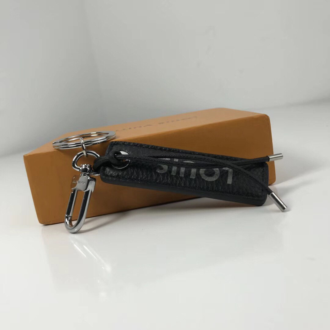 LV TAB LOUIS VUITTON BAG CHARM AND KEY HOLDER M64173