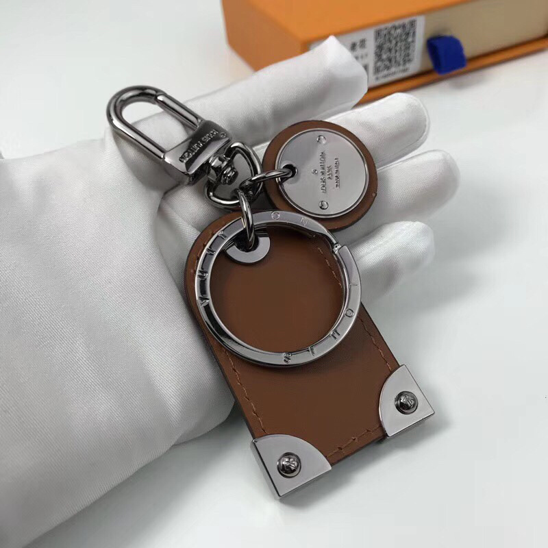 LV TRAVEL TAG BAG CHARM AND KEY HOLDER M64180