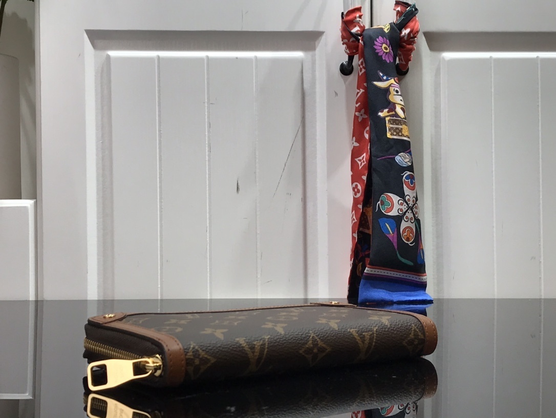 LV TRUNK wallet M80558