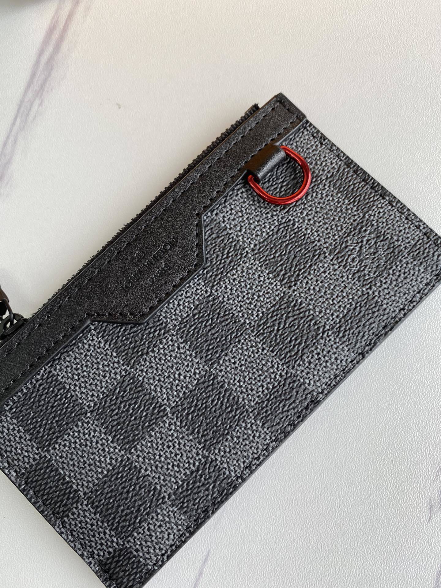 LV UTILITY COIN HOLDER N60354