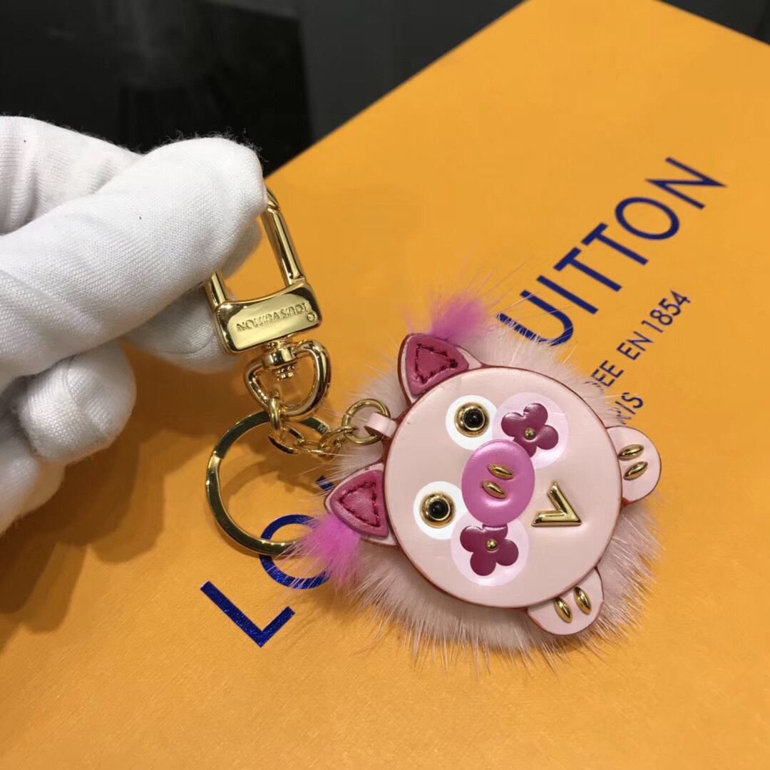 LV WILD FUR PIG BAG CHARM AND KEY HOLDER M64260