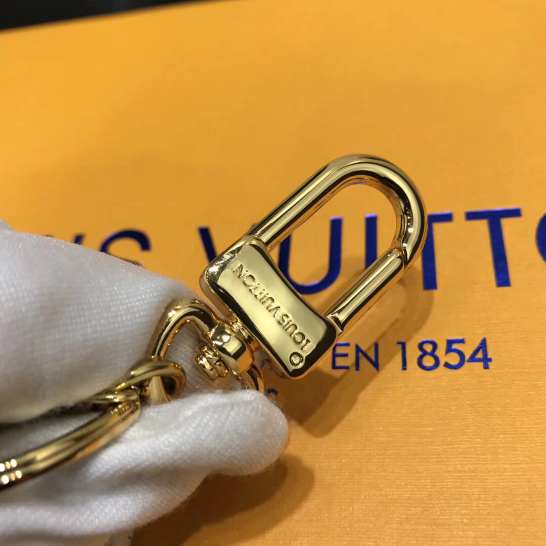 LV WILD FUR PIG BAG CHARM AND KEY HOLDER M64260