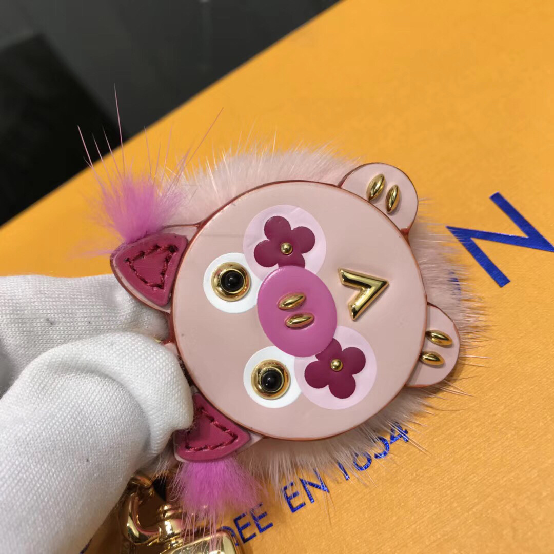 LV WILD FUR PIG BAG CHARM AND KEY HOLDER M64260