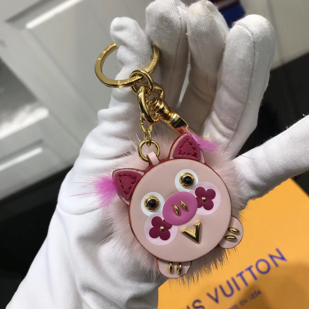 LV WILD FUR PIG BAG CHARM AND KEY HOLDER M64260