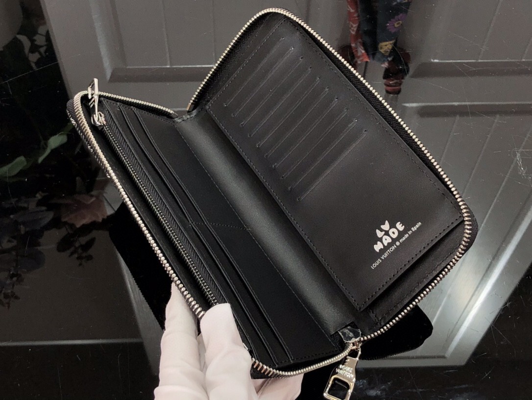 LV ZIPPY VERTICAL wallet M63095PZ 