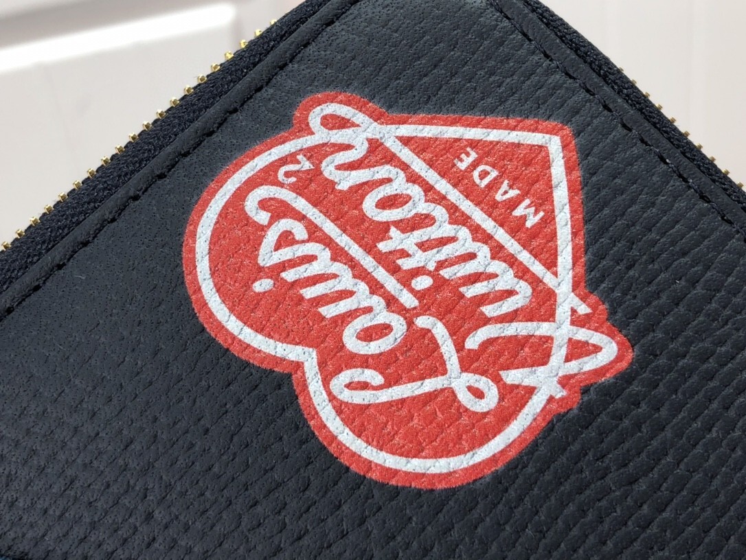 LV ZIPPY VERTICAL wallet M63095PZ 